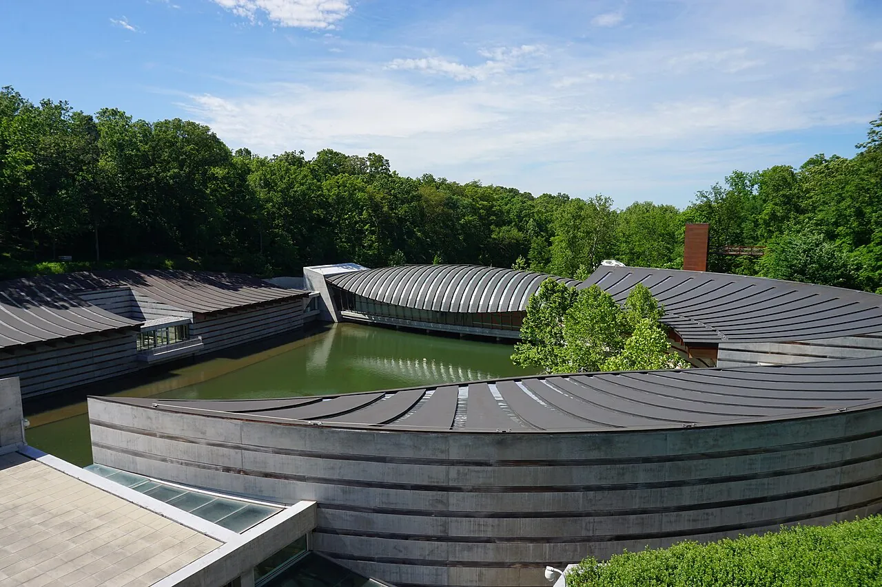 Crystal Bridges Museum and its pond surrounded by Ozark woodland in Bentonville